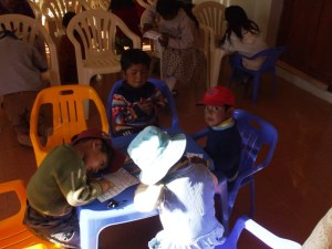 Diego looking at the camera while the others color