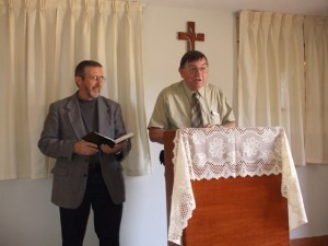 Pastor Gary preaching and Bro. Stanton translating
